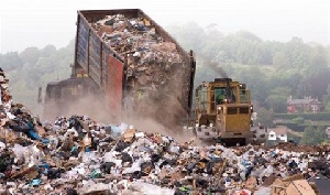 File photo of a refuse truck dumping waste at a site