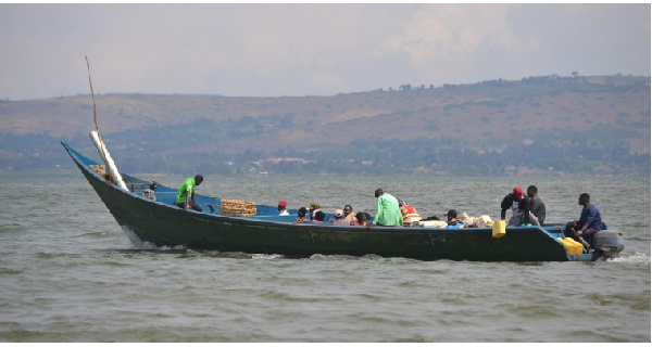 A private boat with passengers leaving Masese landing site in Jinja, Uganda.