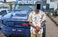 A picture of the guy standing by the police Armoured car he allegedly stole