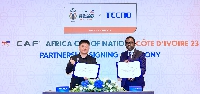 Mr Jack Guo (left) with an official from CAF
