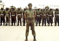 The late JJ Rawlings leads a parade back in the day