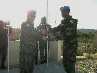 Captain Maxwell Mahama receiving an award for a dedicated service while on UN Peacekeeping Mission