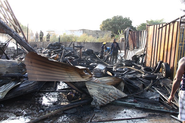 The fire gutted clustered shops along the Aliu Mahama Street