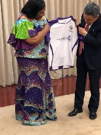 Mrs Rebecca Akufo-Addo receiving a customized Startimes shirt