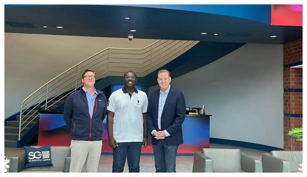 Sammi Awuku, Director General of the National Lottery Authority with officials from Scientific Games