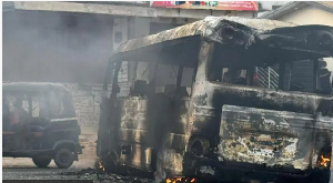 A vehicle burnt during the violent clashes