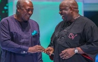 Chief Dele Momodou caught in a delightful mood with Former President John Mahama