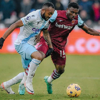 Jordan Ayew (In white) and Kudus Mohammed in a tussle during a Premier League game