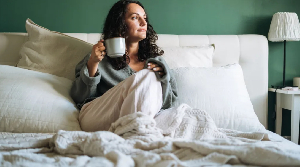A woman reflects during the luteal phase of her menstrual cycle