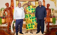 Otumfuo sandwiched by his guests at the Manhyia Palace