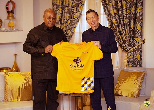 President John Mahama receives World Assemblies of God Congress Shirt from Rev Yeo