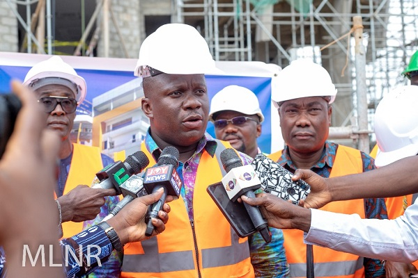 Lands Minister, Samuel Abu Jinapor speaking to the media during a site visit