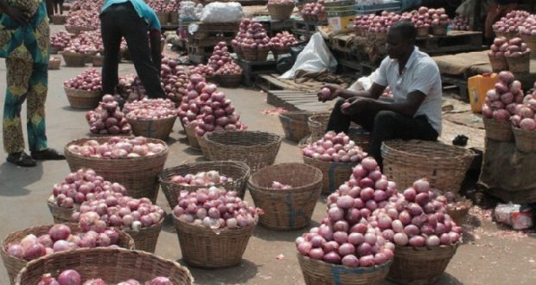 A bucket of onion is being sold for 