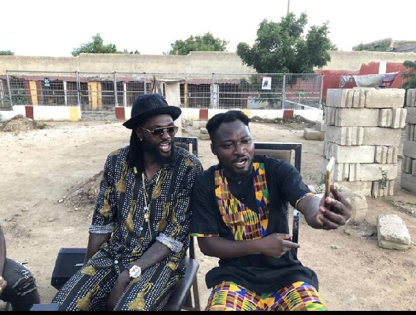 Emmanuel Adebayor and Funny Face