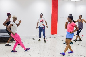 Coach Bino engages some Airtel employees in a workout session