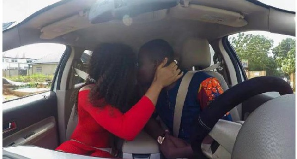Celebrity blogger Zionfelix shares a passionate kiss with Baby Blanche