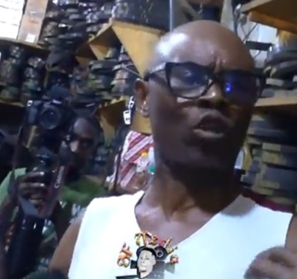 Watch as Nigerian trader confronts taskforce over shop closure