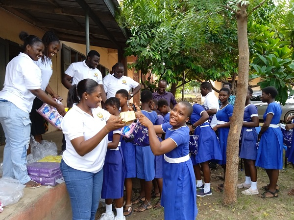 Executives of the National Youth Council of the Trade Union Congress sharing free pads