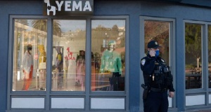 Tiburon police officer James Harris stands outside Yema in Tiburon