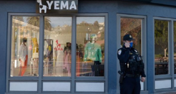 Tiburon police officer James Harris stands outside Yema in Tiburon