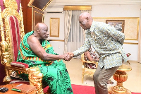 Professor Eric Kwasi Ofori in a handshake with Okyenhene, Osagyefuo Amoatia Ofori Panin
