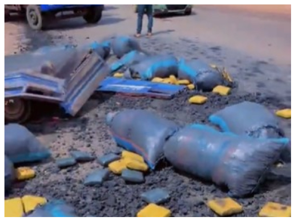 Snipped of slabs of suspected Indian hemp concealed in charcoal