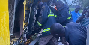 The officers rescuing the driver