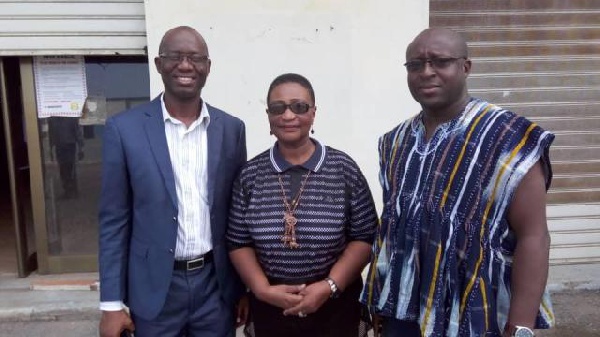 Gloria Commodore (M) with officials from the National Sports Authority (NSA)