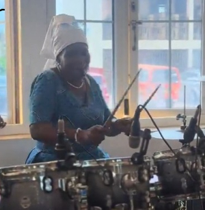 The drummer is a member of Immanuel Congregation of the Presbyterian Church of Ghana The drummer is a member of Immanuel Congregation of the Presbyterian Church of Ghana
