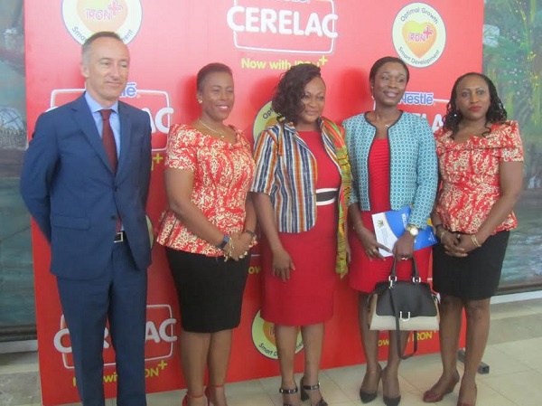 Otiko Afisa Djaba, (M) Minister of Gender, Children and Social Protection with staff of Nestle Ghana