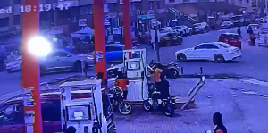 The motor rider pictured buying fuel