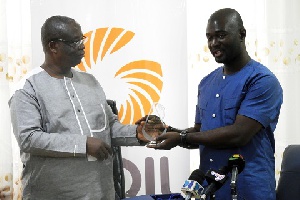 Chief Executive Officer of GOIL, Patrick A.K. Akorlie recieving award from COPEC Executive Secretary