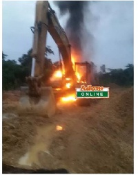 Some military troops set some excavators ablaze at some mining sites