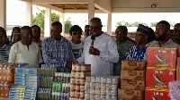 Prof. Asiedu making the donation