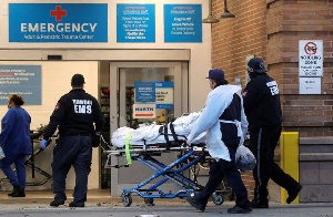 FILE PHOTO: A patient arrives outside Maimonides Medical Center. REUTERS/Brendan McDermid