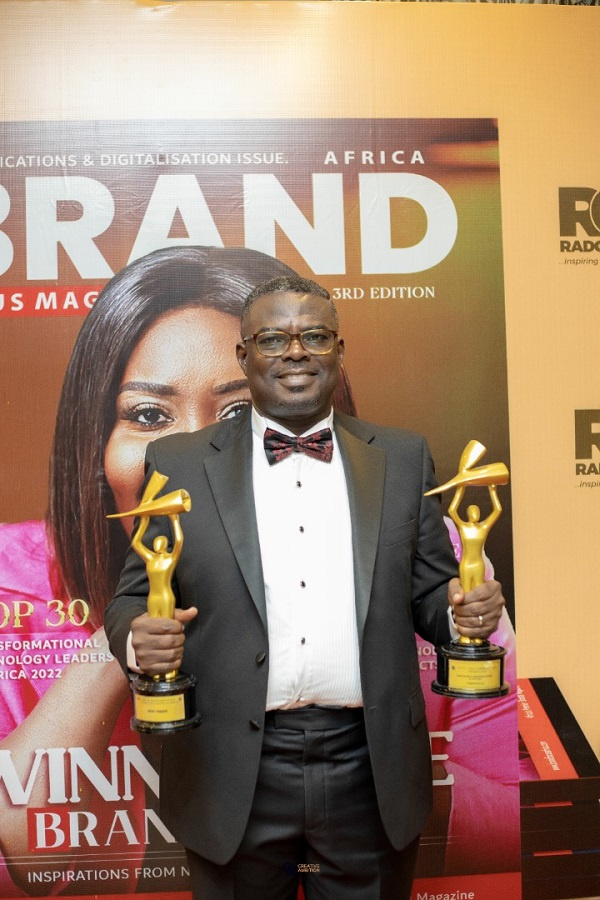 CEO of Cyberteq Falcon Limited, Mr. Ben Tagoe with the awards