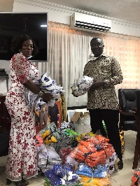 Prof. Frimpong Boateng presented the items to the MP for Evalue-Gwira, Catherine Ablema Afeku