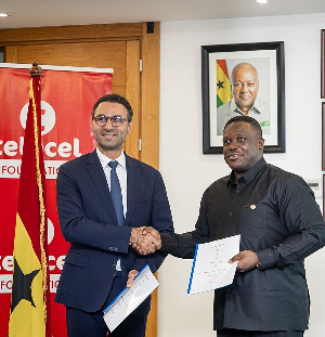 CEO of Telecel Group, Moh Damush and Minister of Communications, Sam George