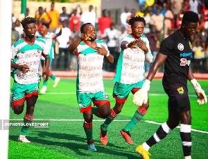 Giyas Ibrahim [27] celebrates his goal with teammates