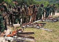 The military with the impounded chainsaw machines