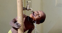 A child drinks tap water.