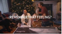 These adults burst out in excitement as they unwrap their Christmas gifts