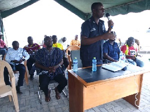 Chief Supritendent Appiah in middle addressing transport operators