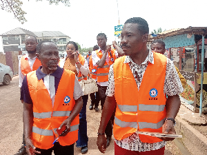 Shai Osudoku DCE (r) with the Rating Officer (l) and other field officers