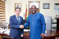 Egyptian Ambassador to Ghana, Emad Magdy Hanna in a handshake with Sports Minister Isaac Asiamah