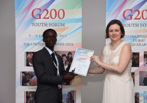 Ghanaian Diplomat , Steven Blessing Ackah receiving his award