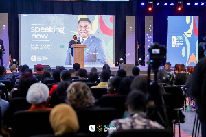 Daniel Asomani speaking to the audience