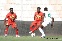 Tariq Lamptey and Fatawu Issahaku in action against Niger