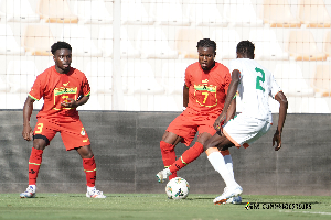 Tariq Lamptey and Fatawu Issahaku in action against Niger