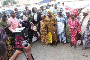 The old women in a group photo with Abeiku Santana and Kofi Wayo